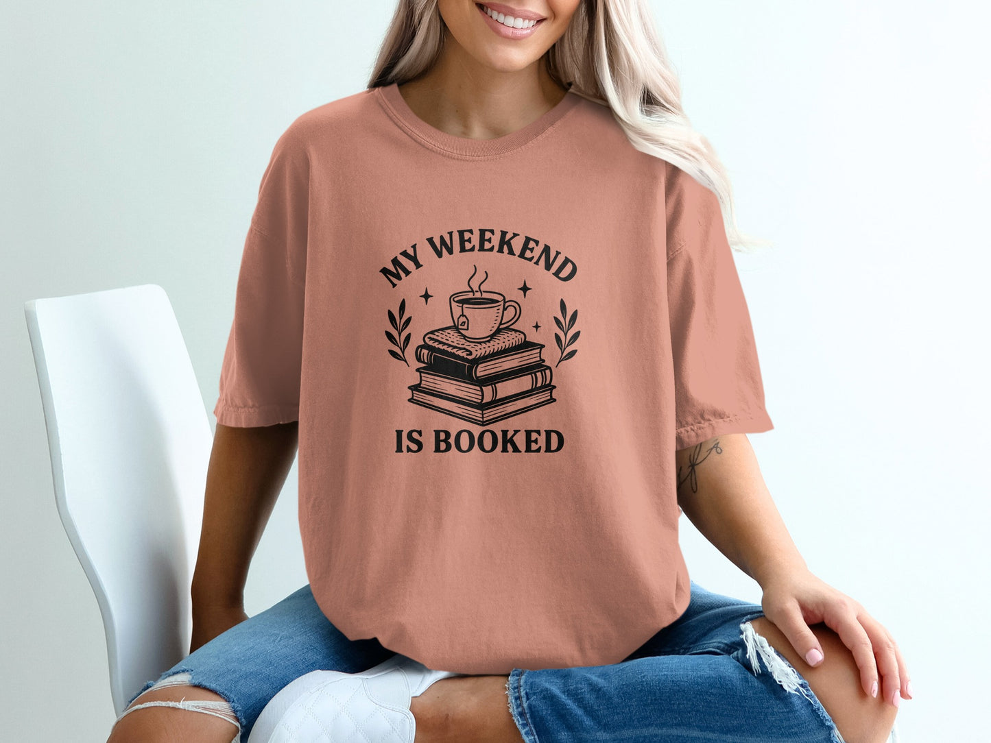 My Weekend is Booked Stack of Books Graphic Tee product