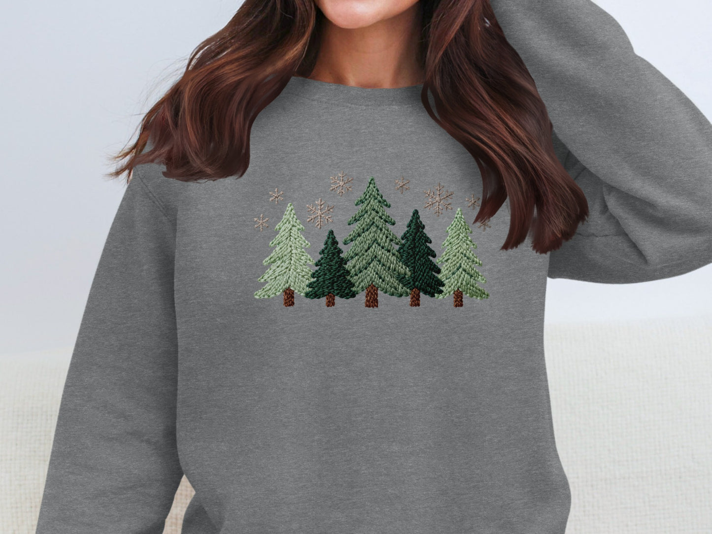 Cozy Up with Our Embroidered Winter Tree Sweatshirt