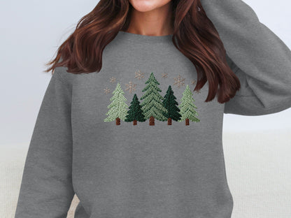 Cozy Up with Our Embroidered Winter Tree Sweatshirt