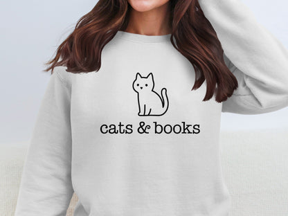 Cozy Sweatshirt with Cats and Books Design