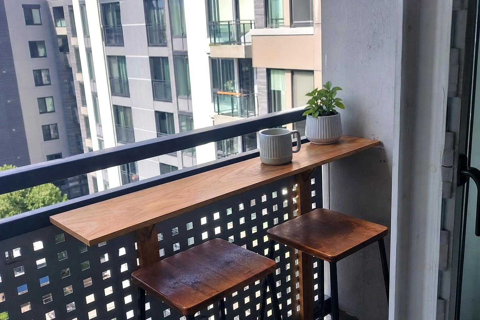 Small Balcony Bar Ideas With Stools and a Rail Shelf