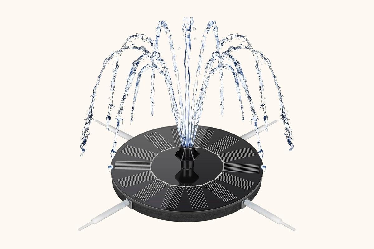 Small tabletop fountain positioned near a balcony chair